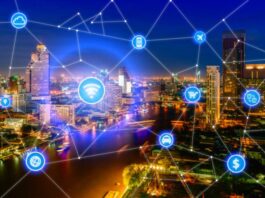 Top 5 Challenges for Building Smart Cities Smart city and wireless communication network, business district with office building, abstract image visual, internet of things concept