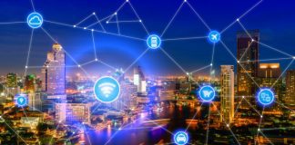 Top 5 Challenges for Building Smart Cities Smart city and wireless communication network, business district with office building, abstract image visual, internet of things concept