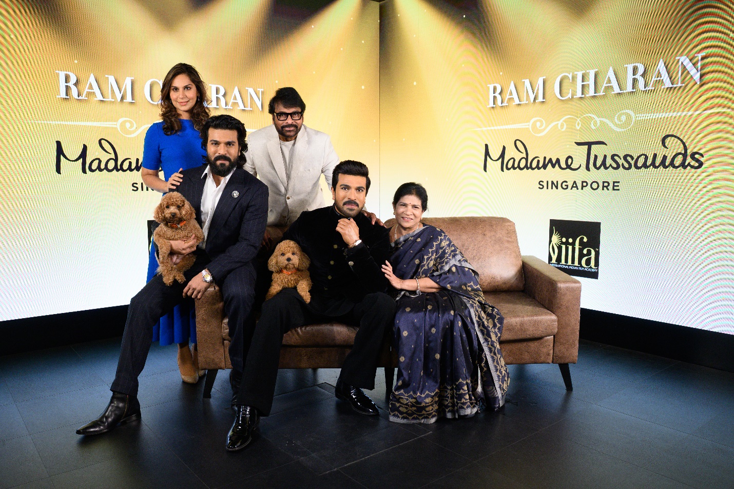 Ram Charan is joined by his family at figure unveiling, including his father Mr Chiranjeevi