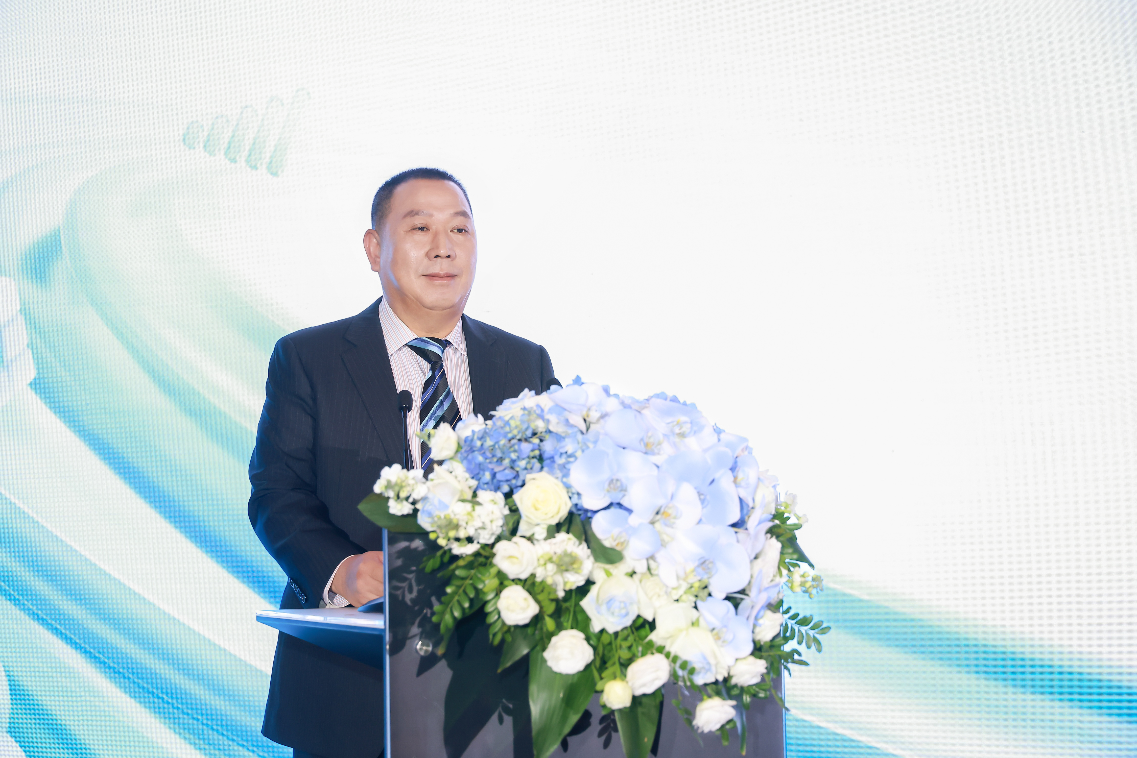 Liuping Song, Huawei's Chief Legal Officer, delivering opening remarks