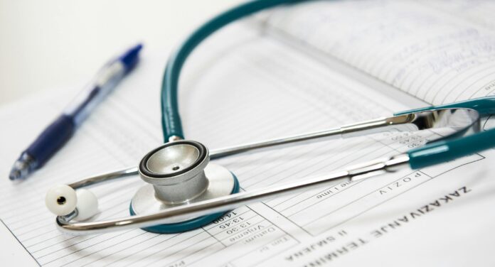 stethoscope-on-medical-records-book