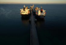 Iran Reopens Hormuz — Oil Crashes 12%. But the War Isn’t Over.