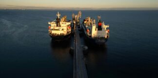 Iran Reopens Hormuz — Oil Crashes 12%. But the War Isn’t Over