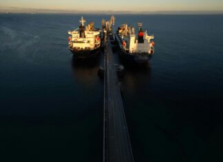 Iran Reopens Hormuz — Oil Crashes 12%. But the War Isn’t Over