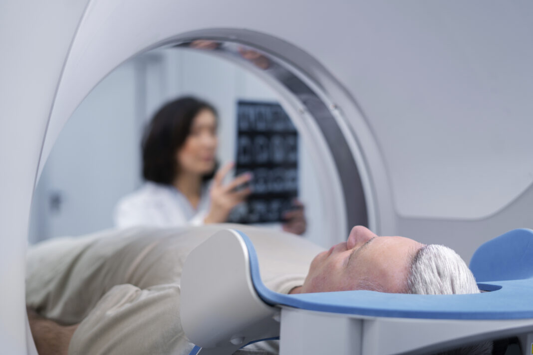 doctor-getting-patient-ready-ct-scan