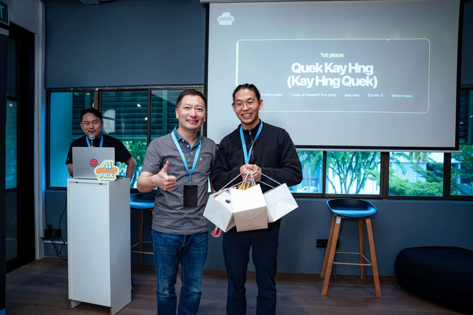 Xin Fu, VP of Engineering at Coupang (left), and winner Kay Hng Quek (right)