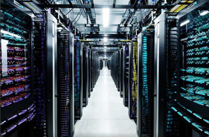 bare-metal hypervisor modern data center server racks with coloured cables and enterprise infrastructure